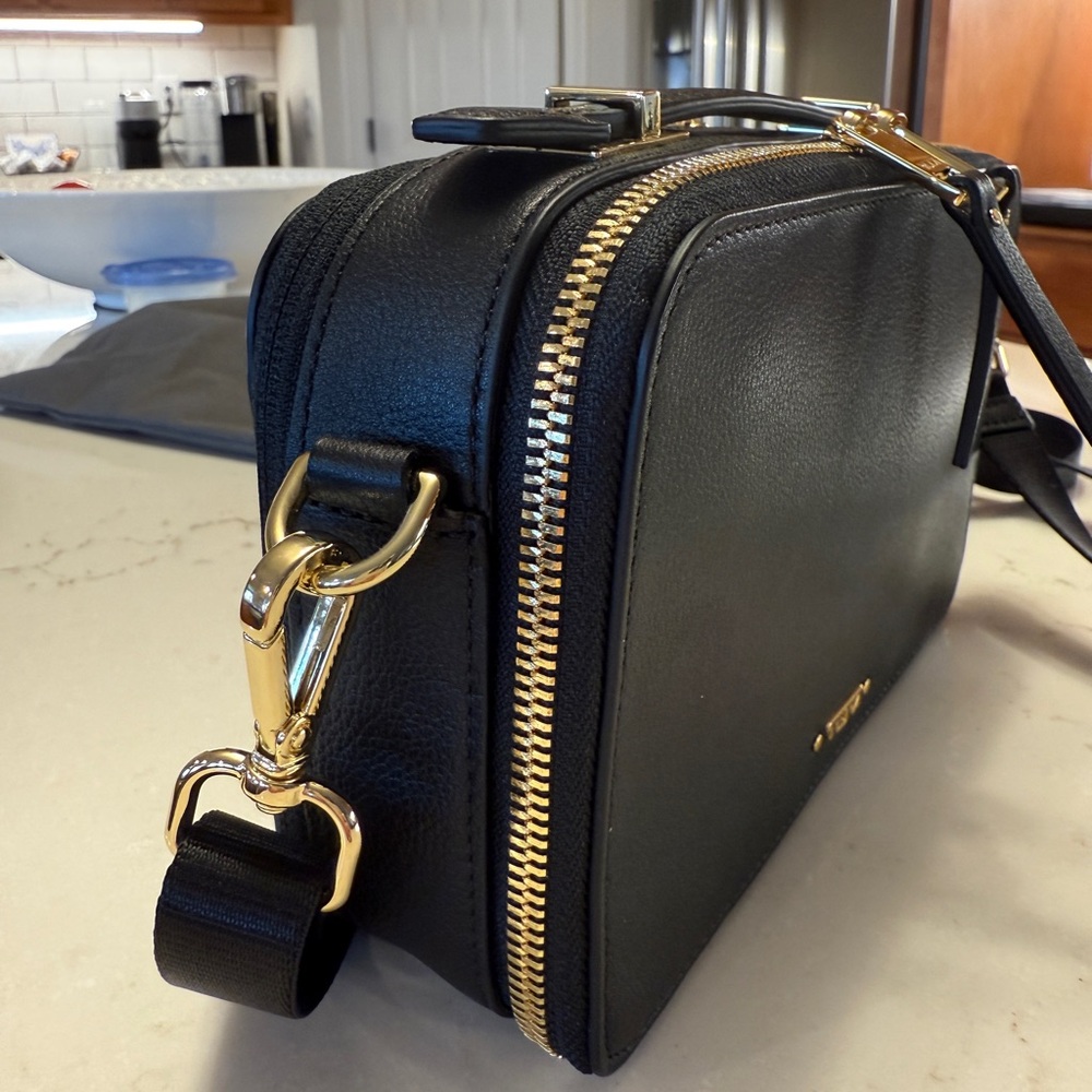 TUMI Black Crossbody Bag with Gold Accents - Picture 3 of 9